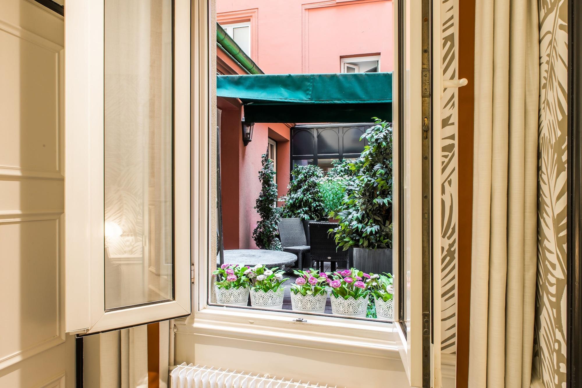 Hotel Jardin Le Brea Paris Bagian luar foto