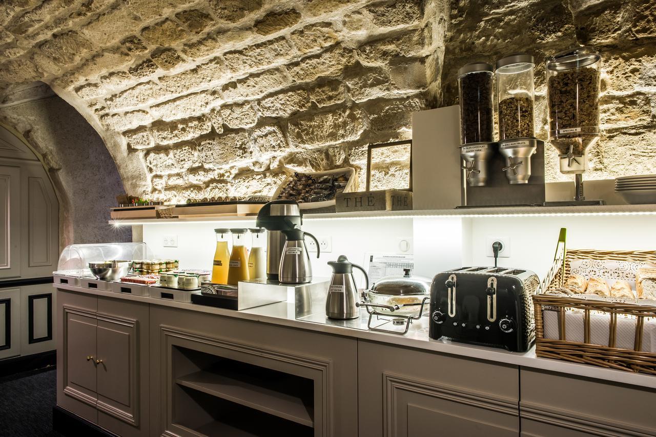 Hotel Jardin Le Brea Paris Bagian luar foto